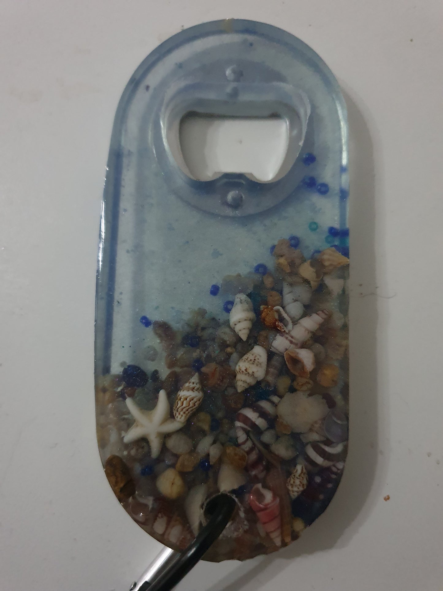 Functional art - seascape bottle openers