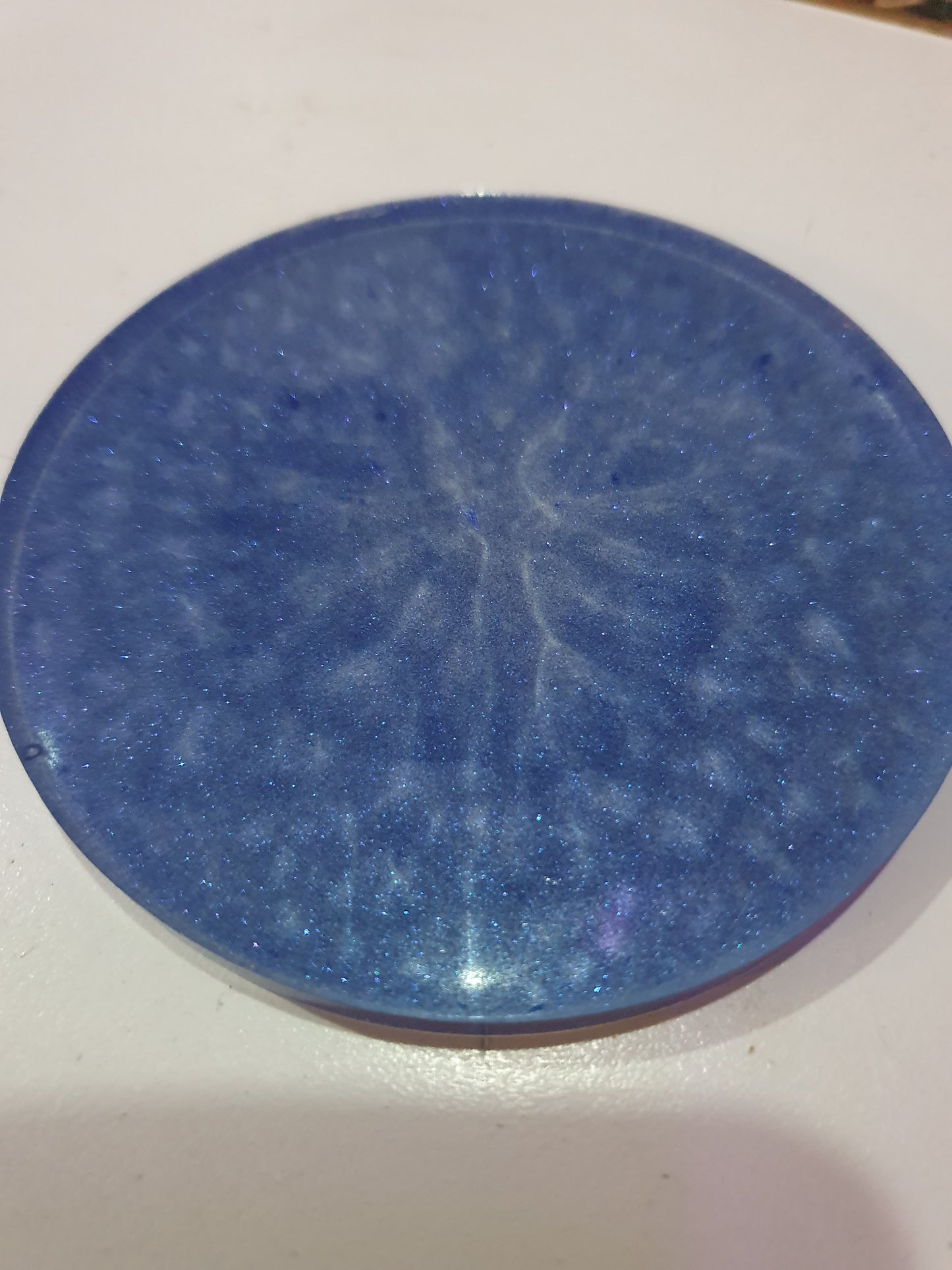 Functional art - round drink coasters and stand in the colours of the ocean
