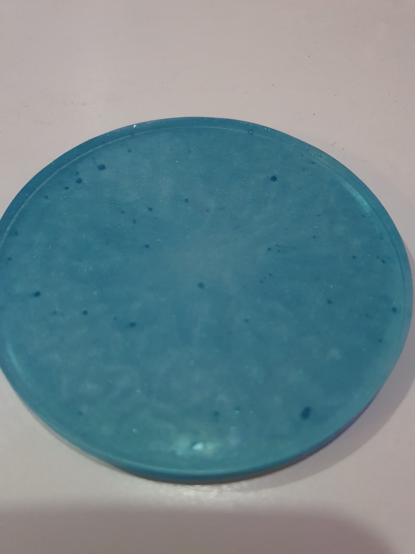 Functional art - round drink coasters and stand in the colours of the ocean