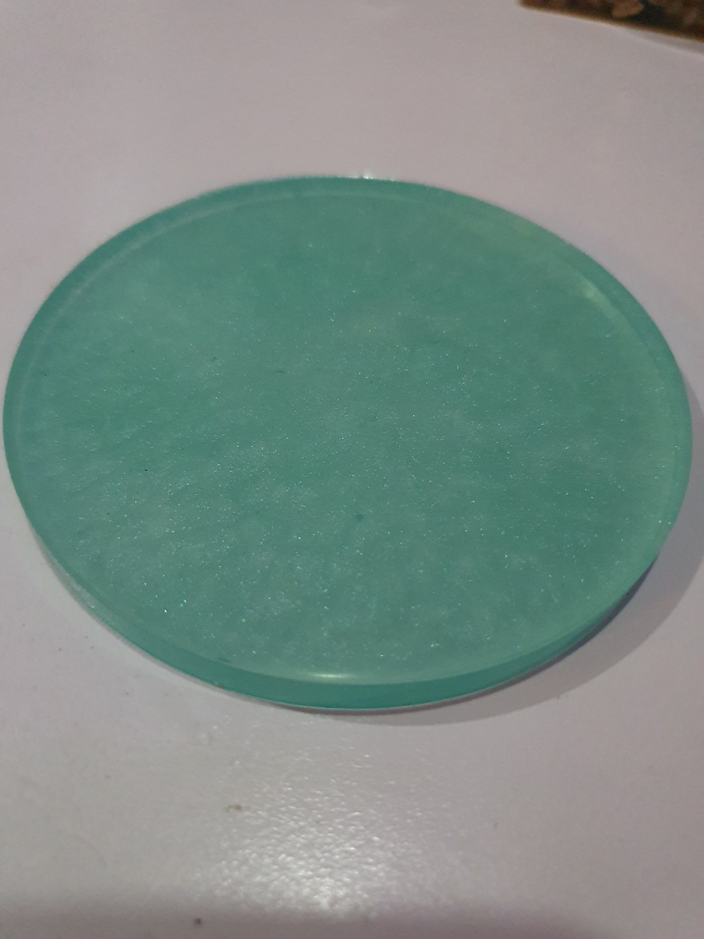 Functional art - round drink coasters and stand in the colours of the ocean