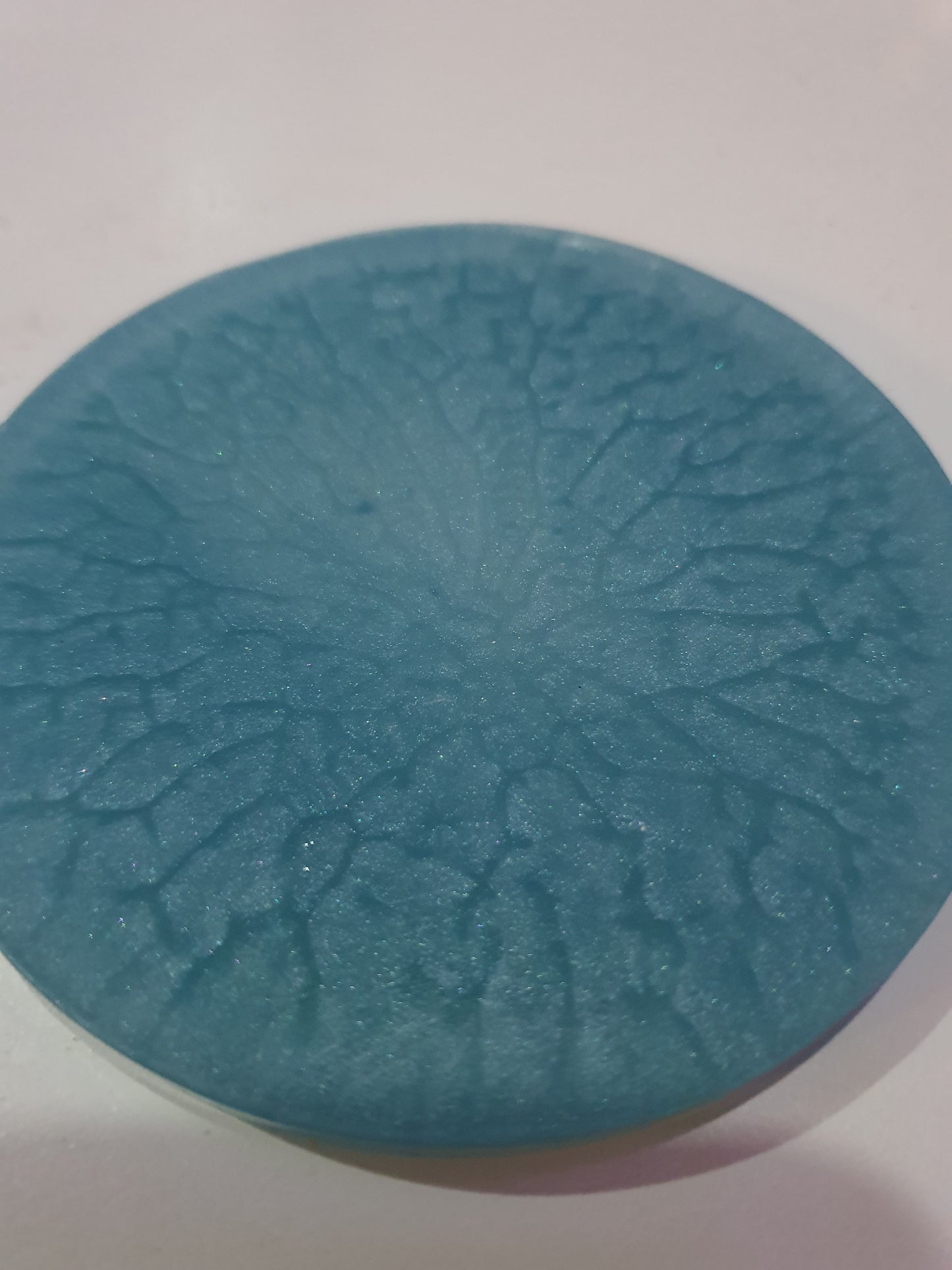 Functional art - round drink coasters and stand in the colours of the ocean