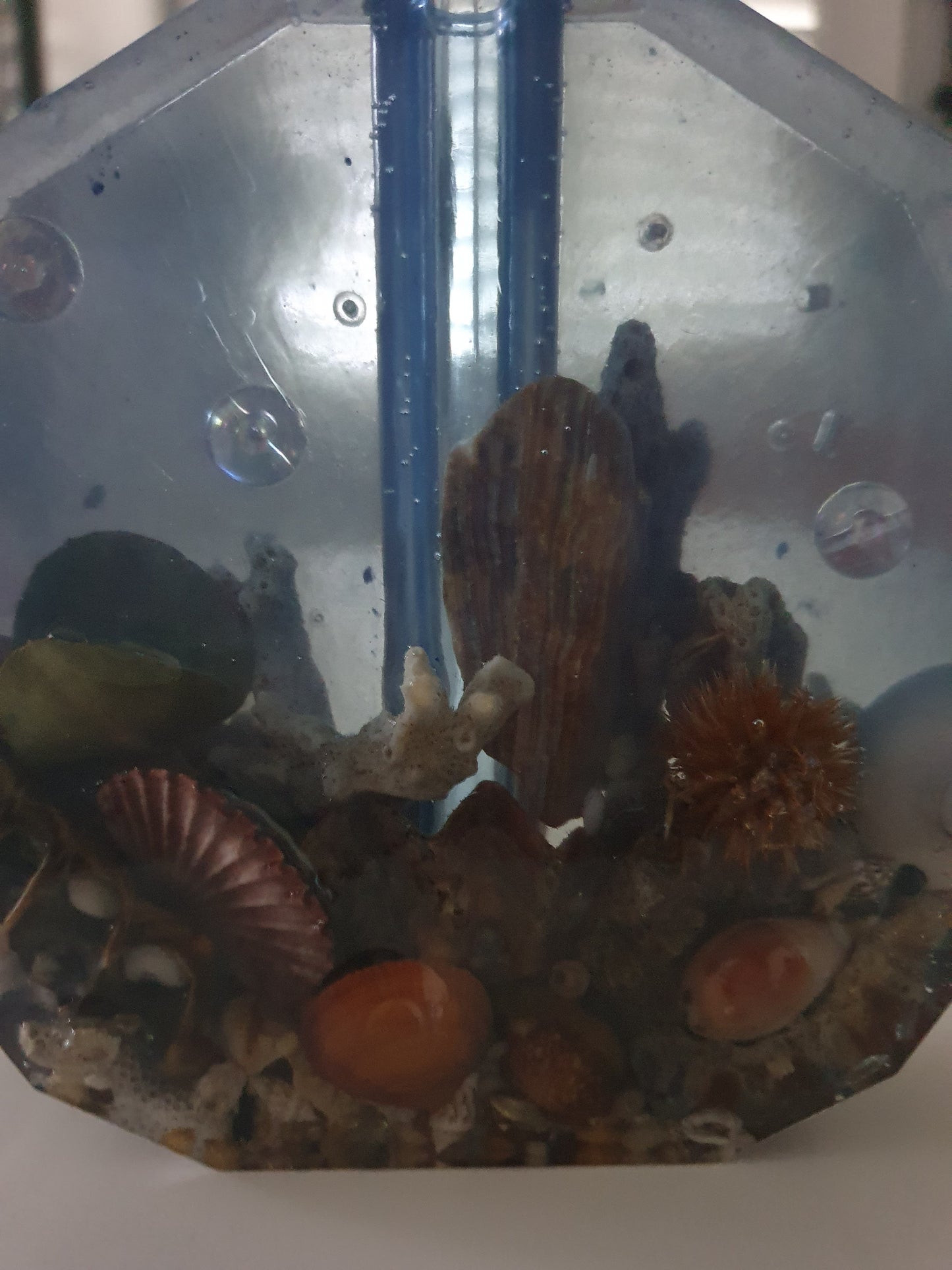 Translucent blue seascape vase