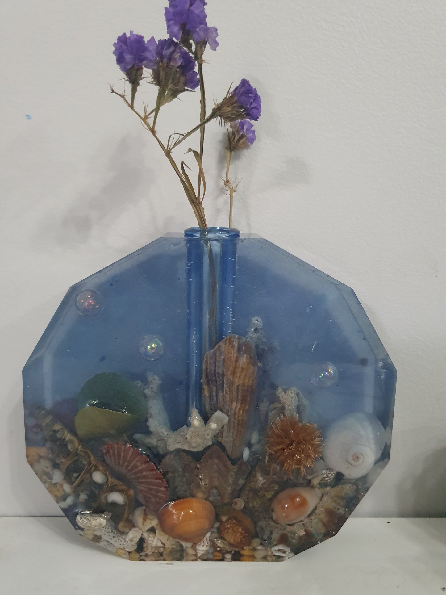 Translucent blue seascape vase
