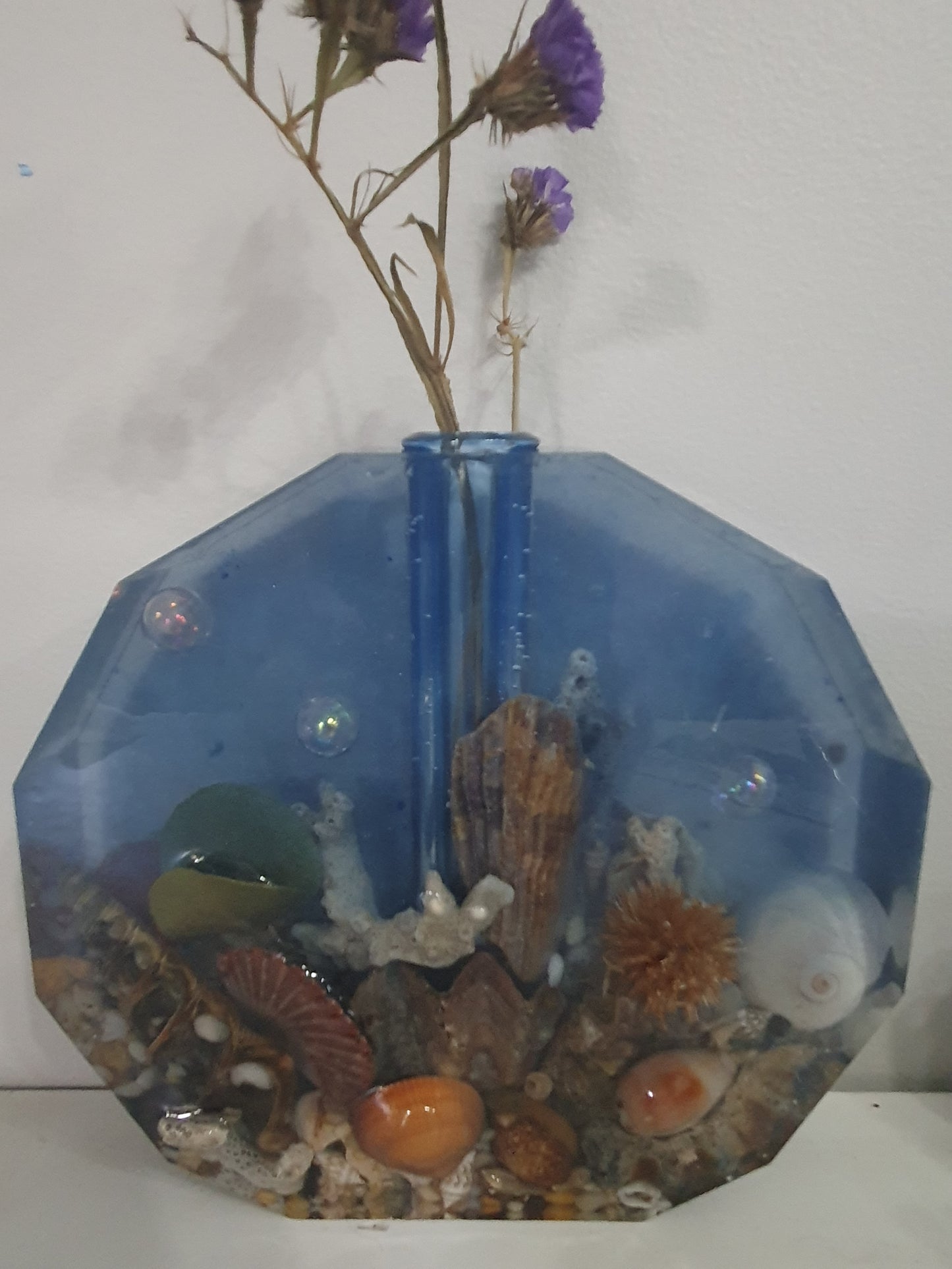 Translucent blue seascape vase