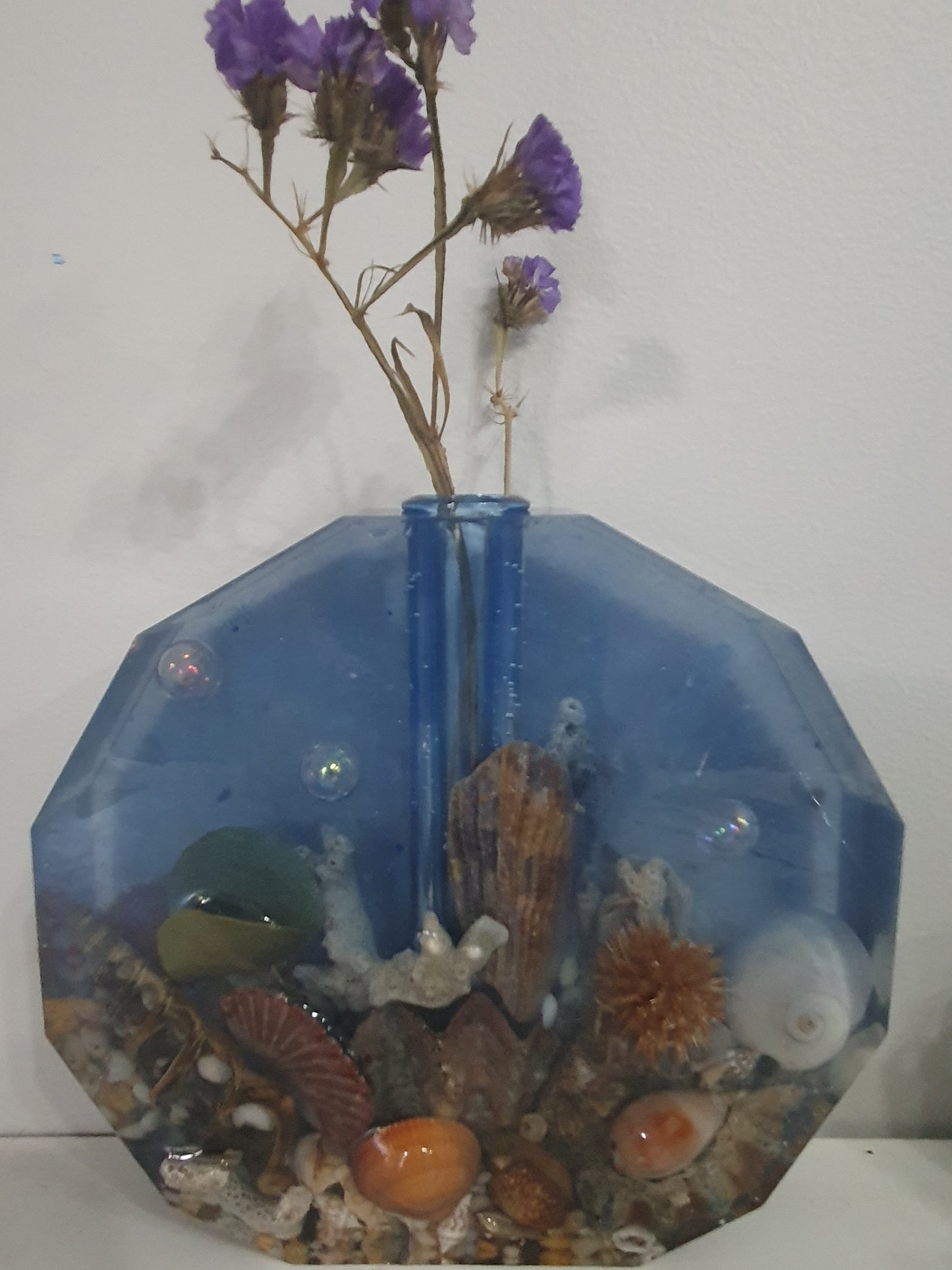 Translucent blue seascape vase