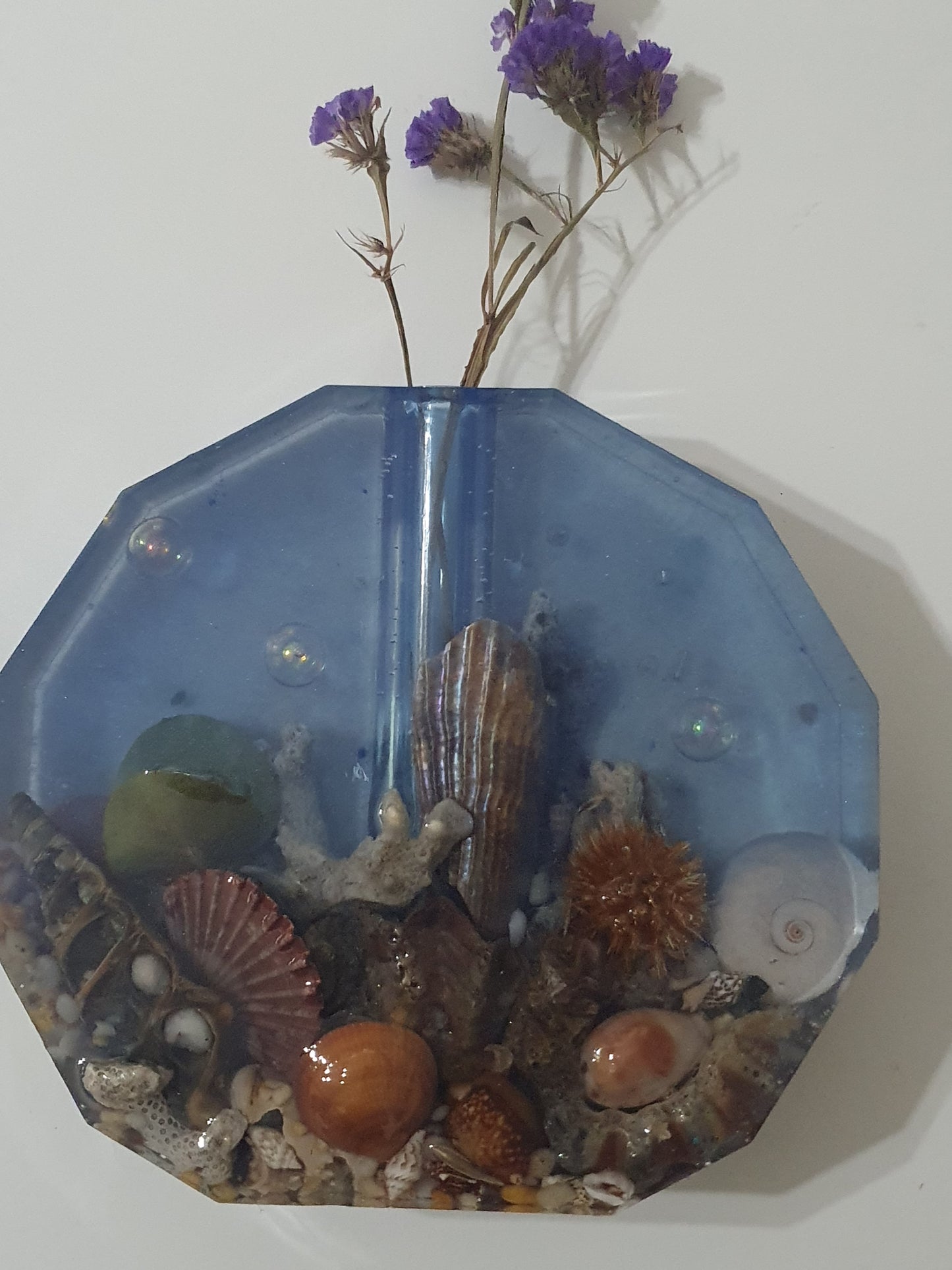 Translucent blue seascape vase