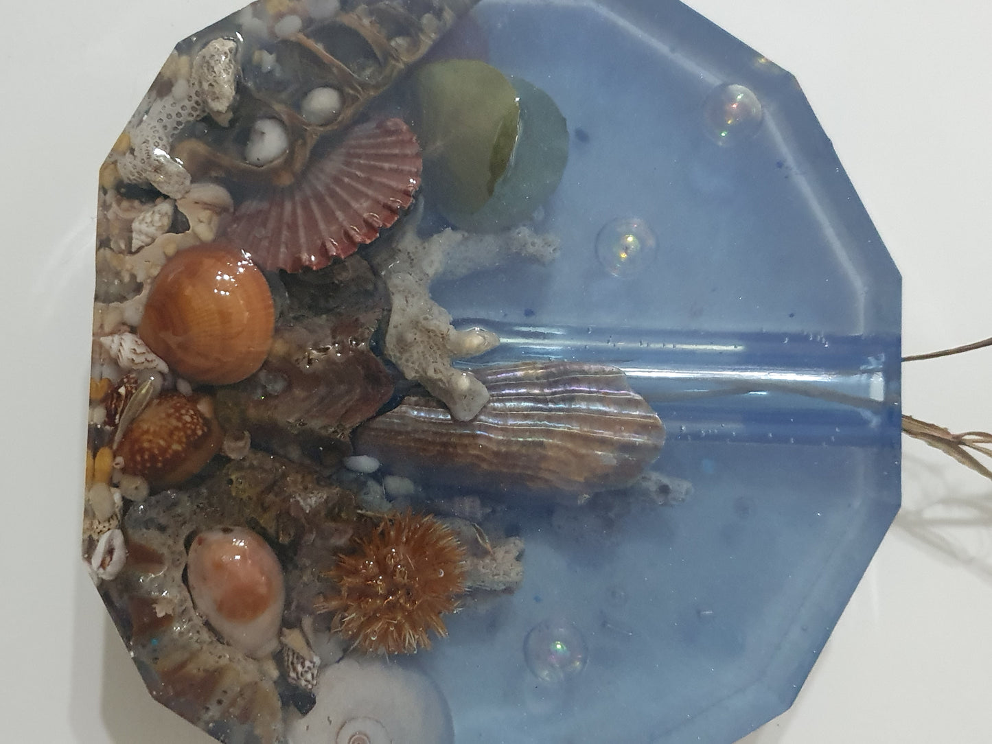 Translucent blue seascape vase