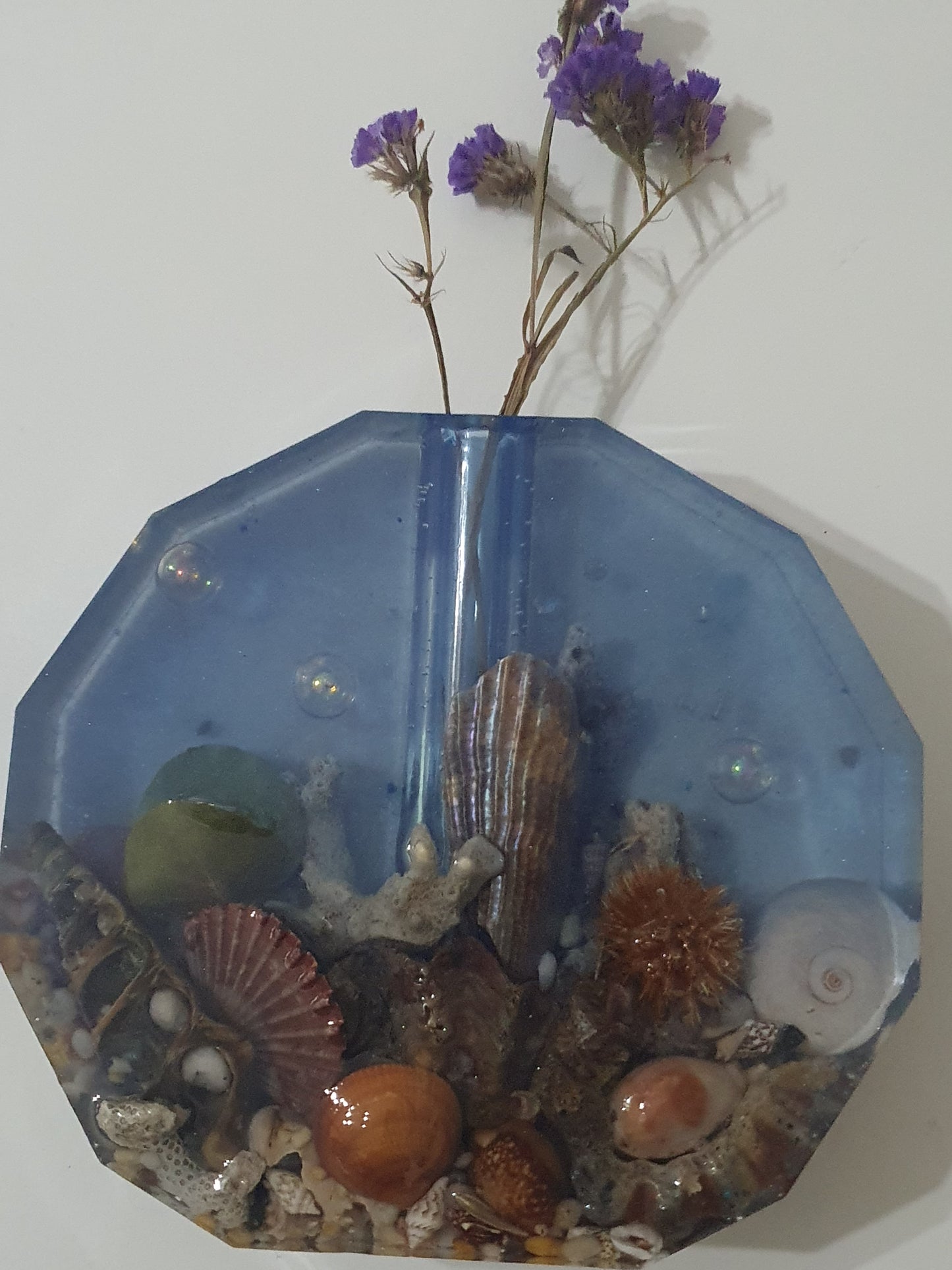 Translucent blue seascape vase