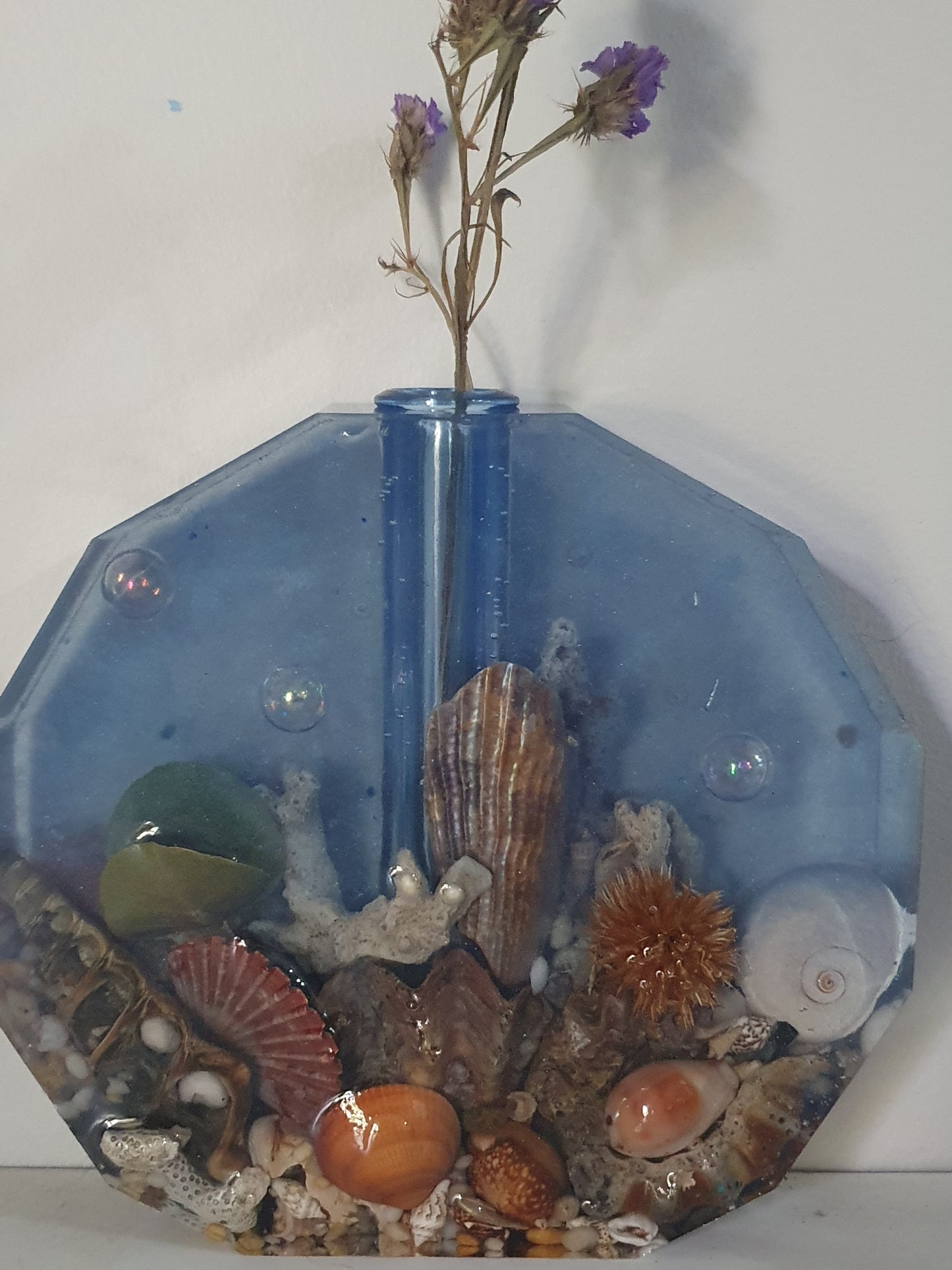 Translucent blue seascape vase