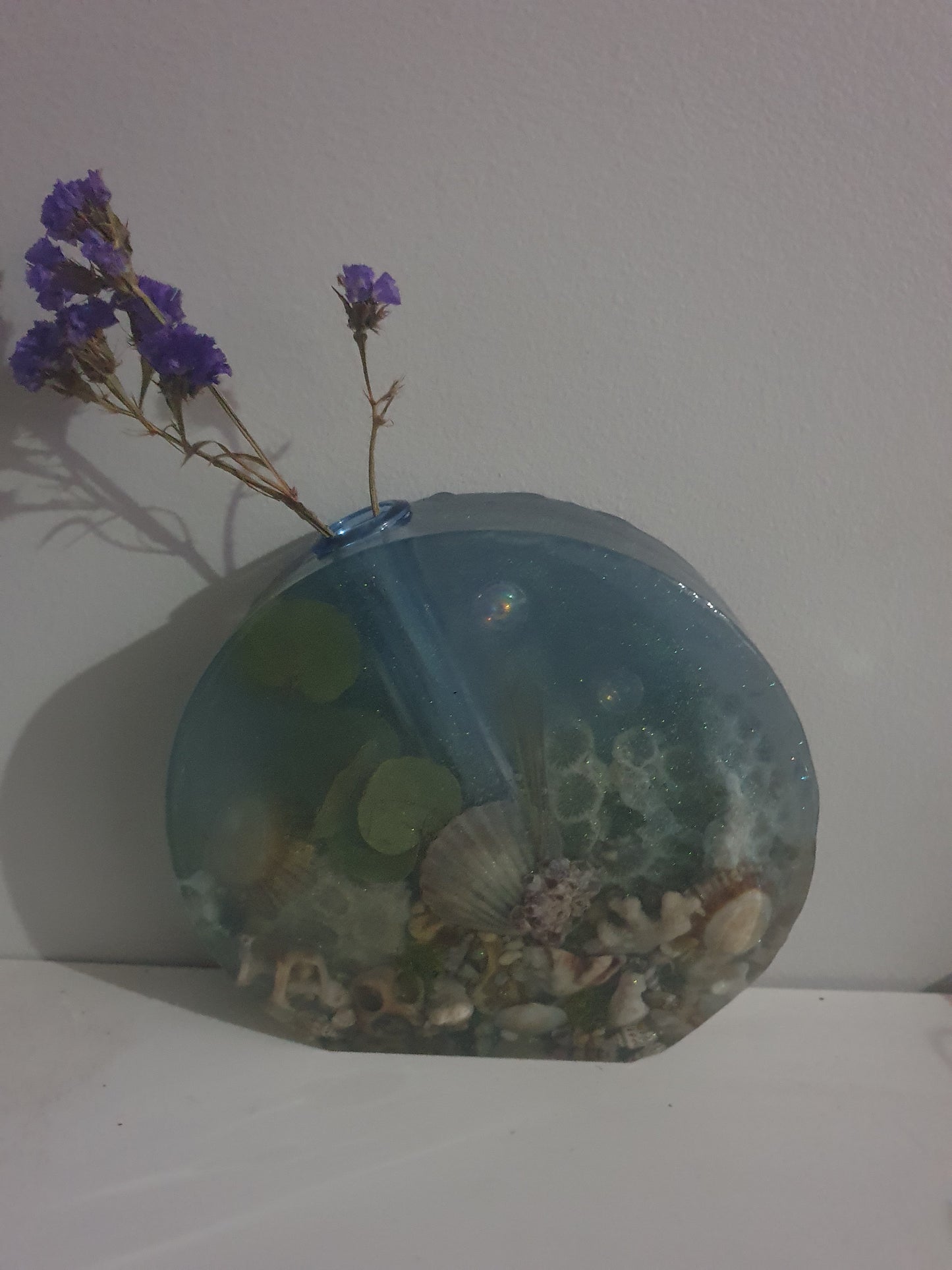 Translucent sparkling blue seascape round vase