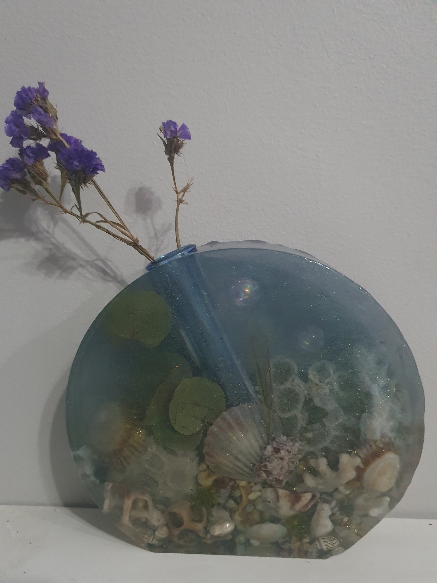 Translucent sparkling blue seascape round vase