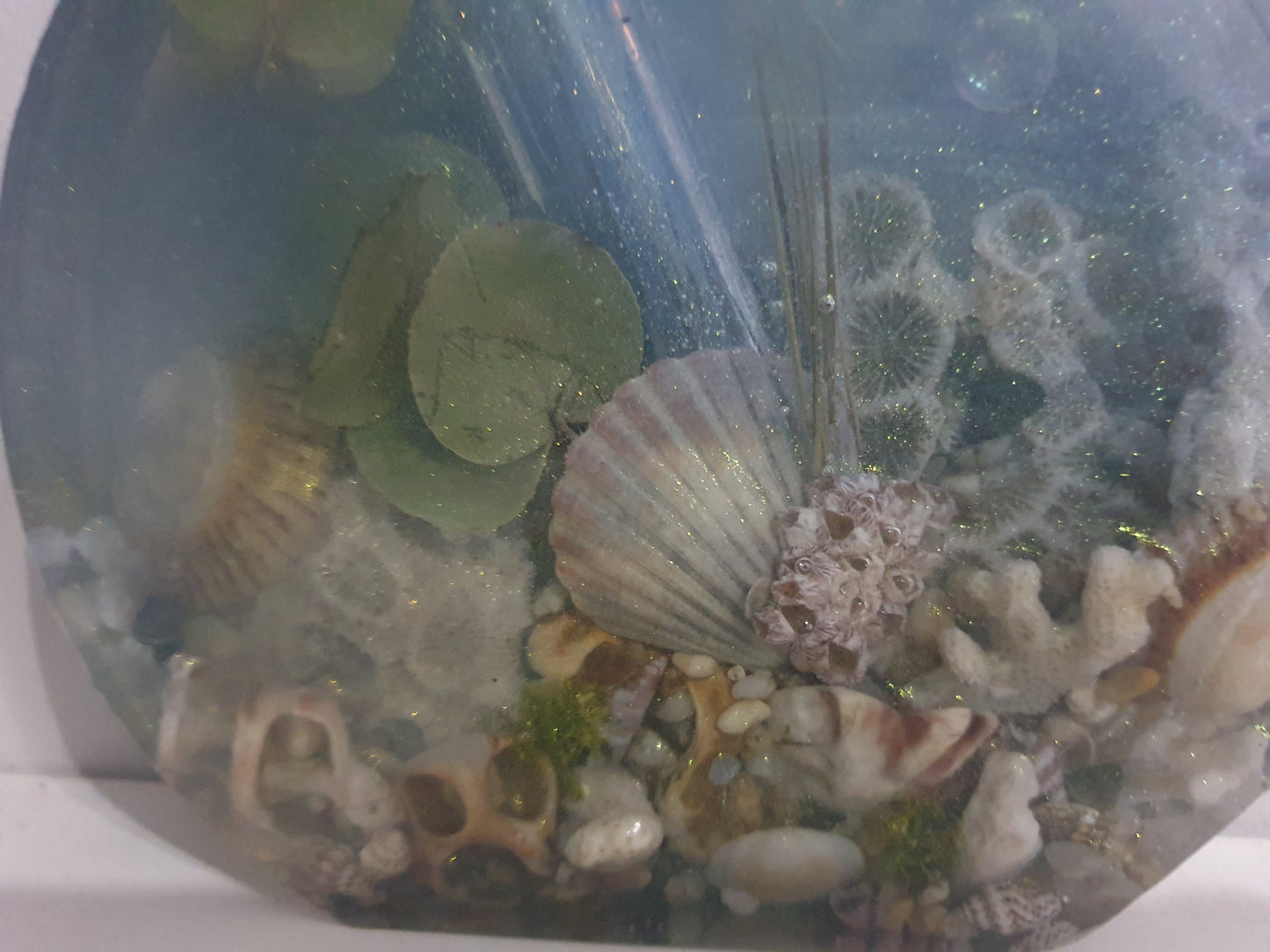 Translucent sparkling blue seascape round vase