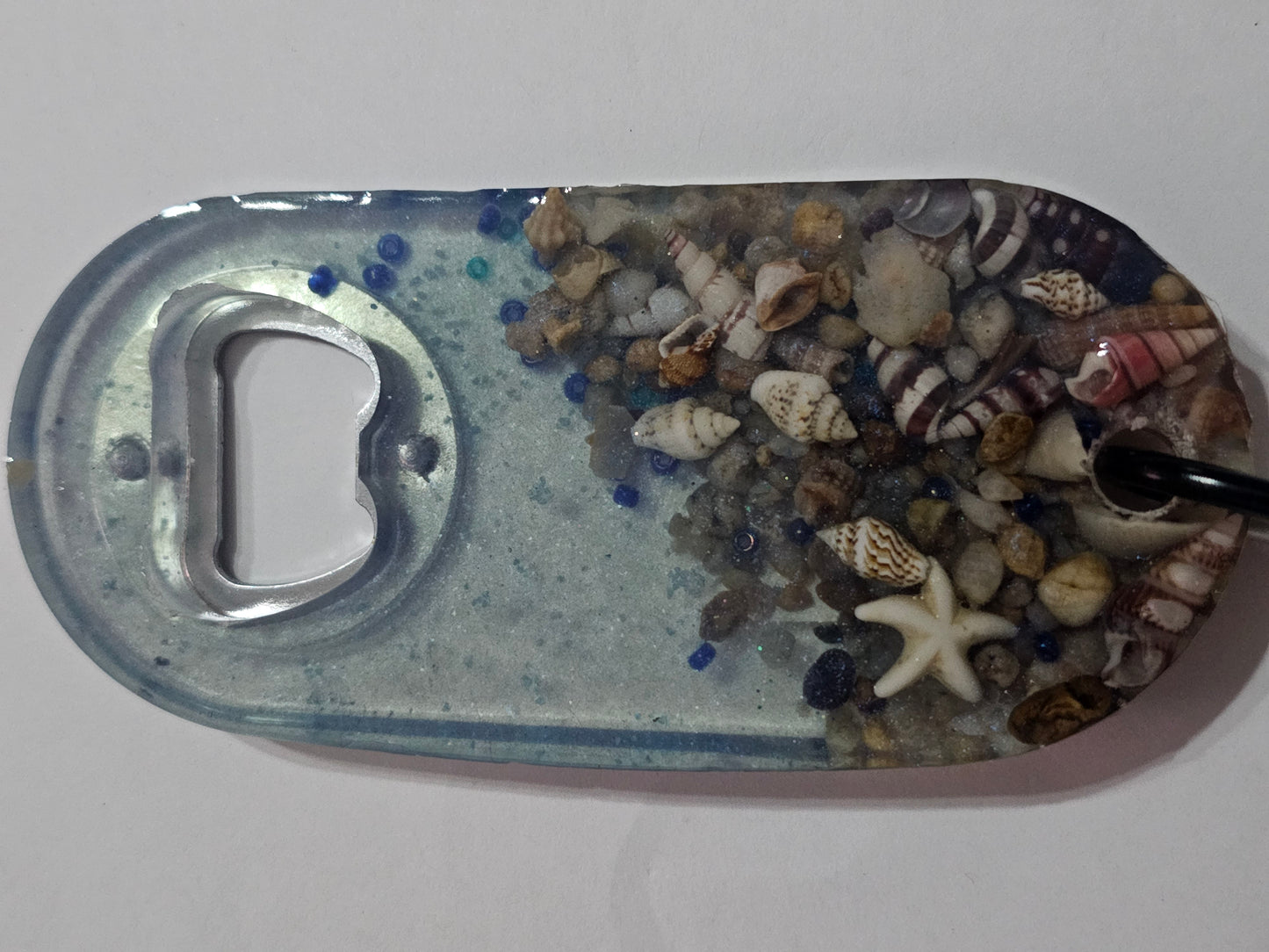 Functional art - seascape bottle openers