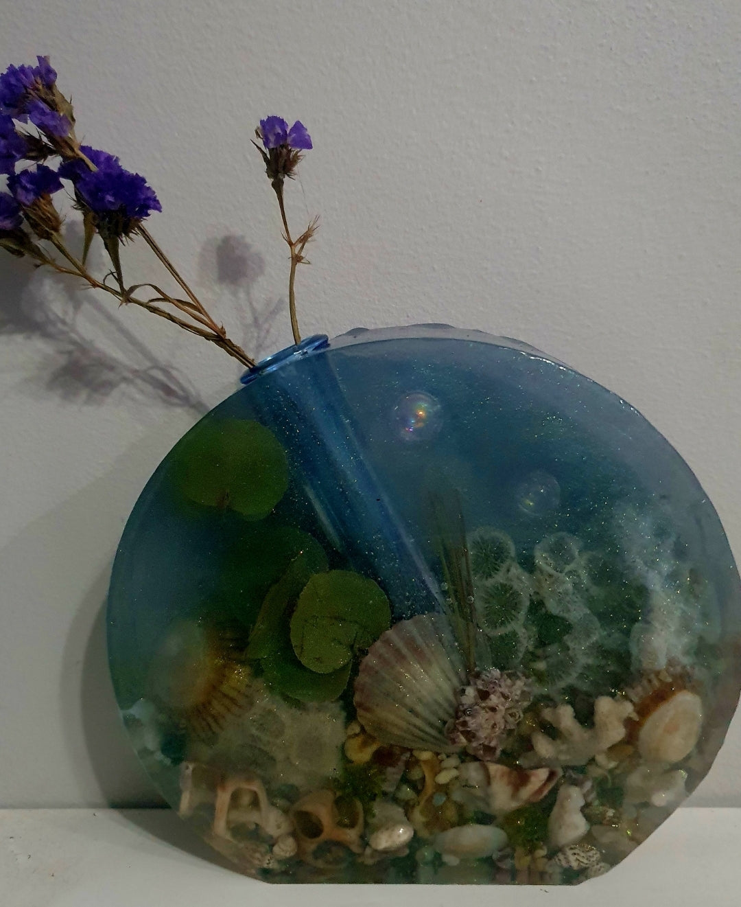 Translucent sparkling blue seascape round vase
