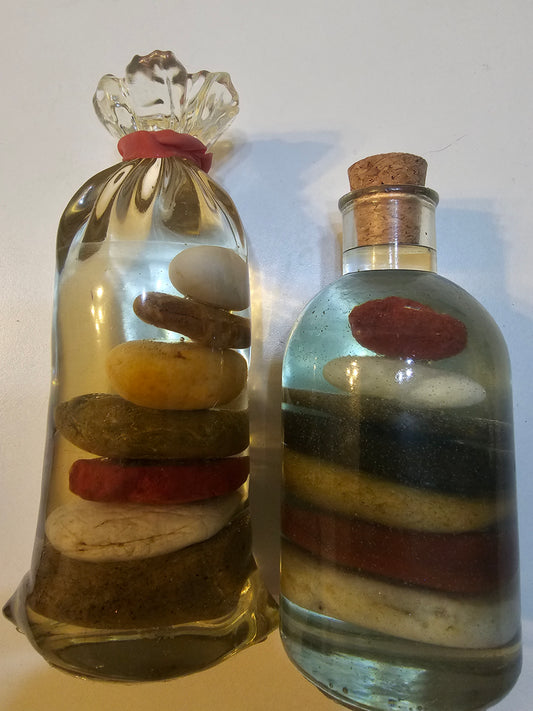 Stacked beach stones in a bottle or bag
