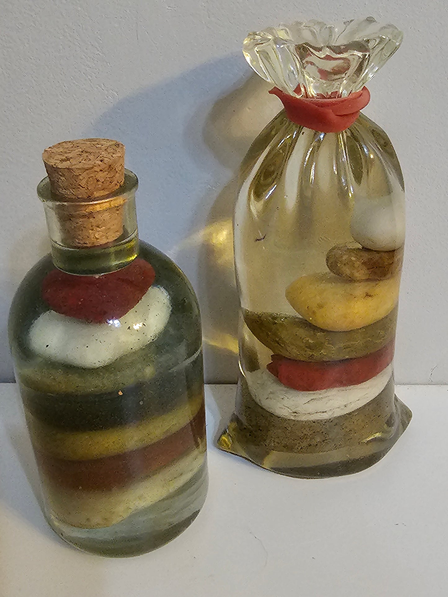 Stacked beach stones in a bottle or bag