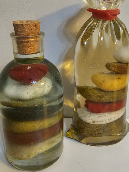 Stacked beach stones in a bottle or bag