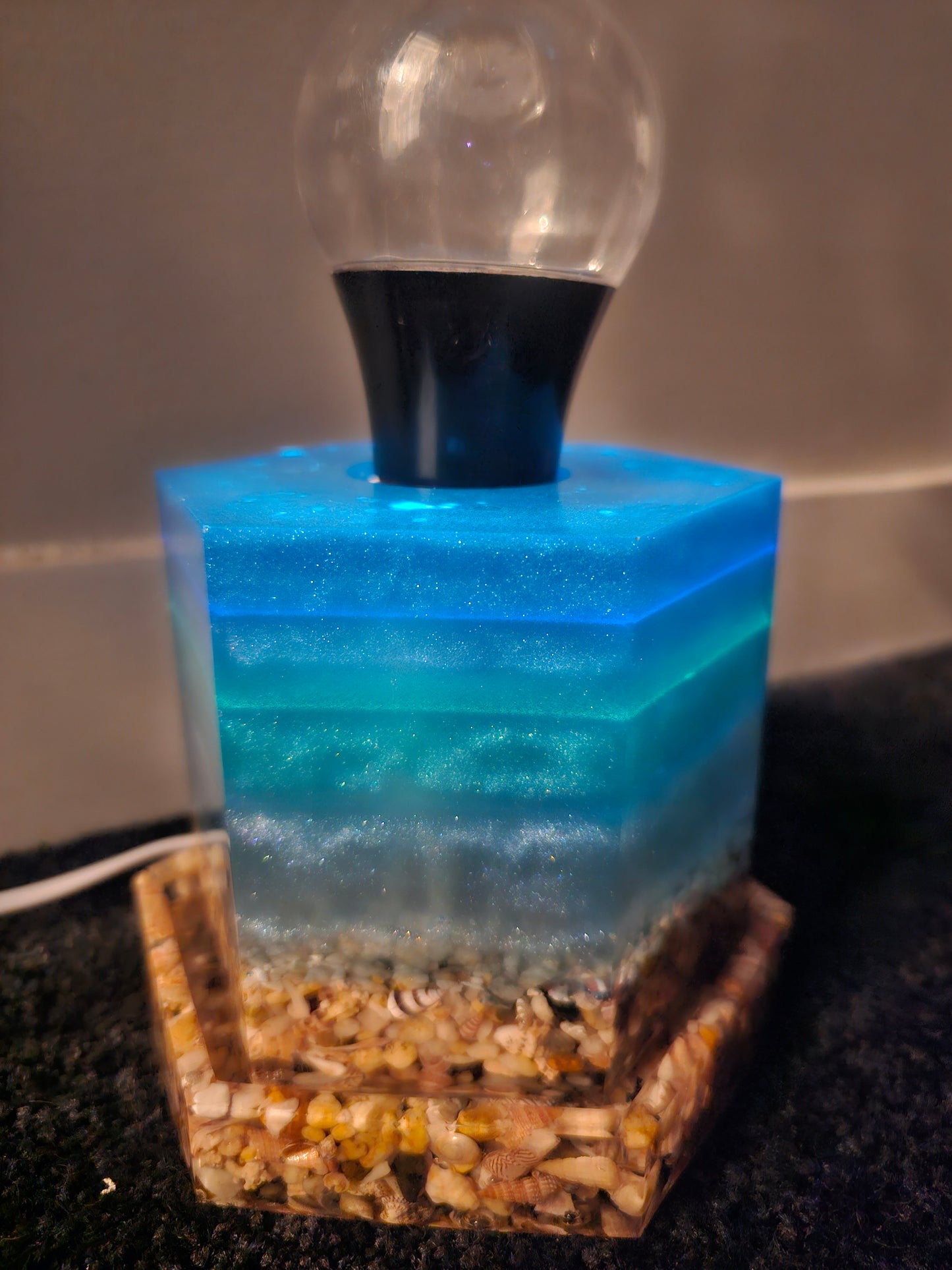 Magical transforming ocean waters lamp